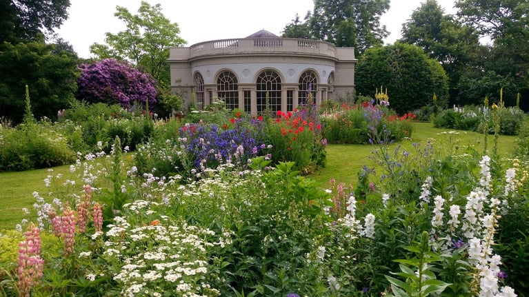 A view of Mrs Child's Garden with the Garden House at Osterley in the summer